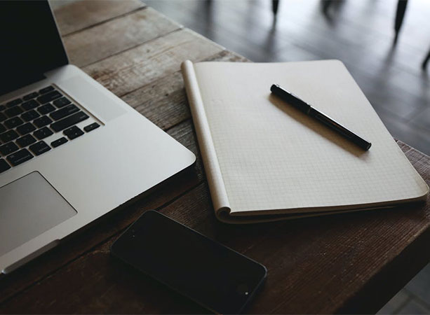 Signature Talks inspiration with a pen and paper
