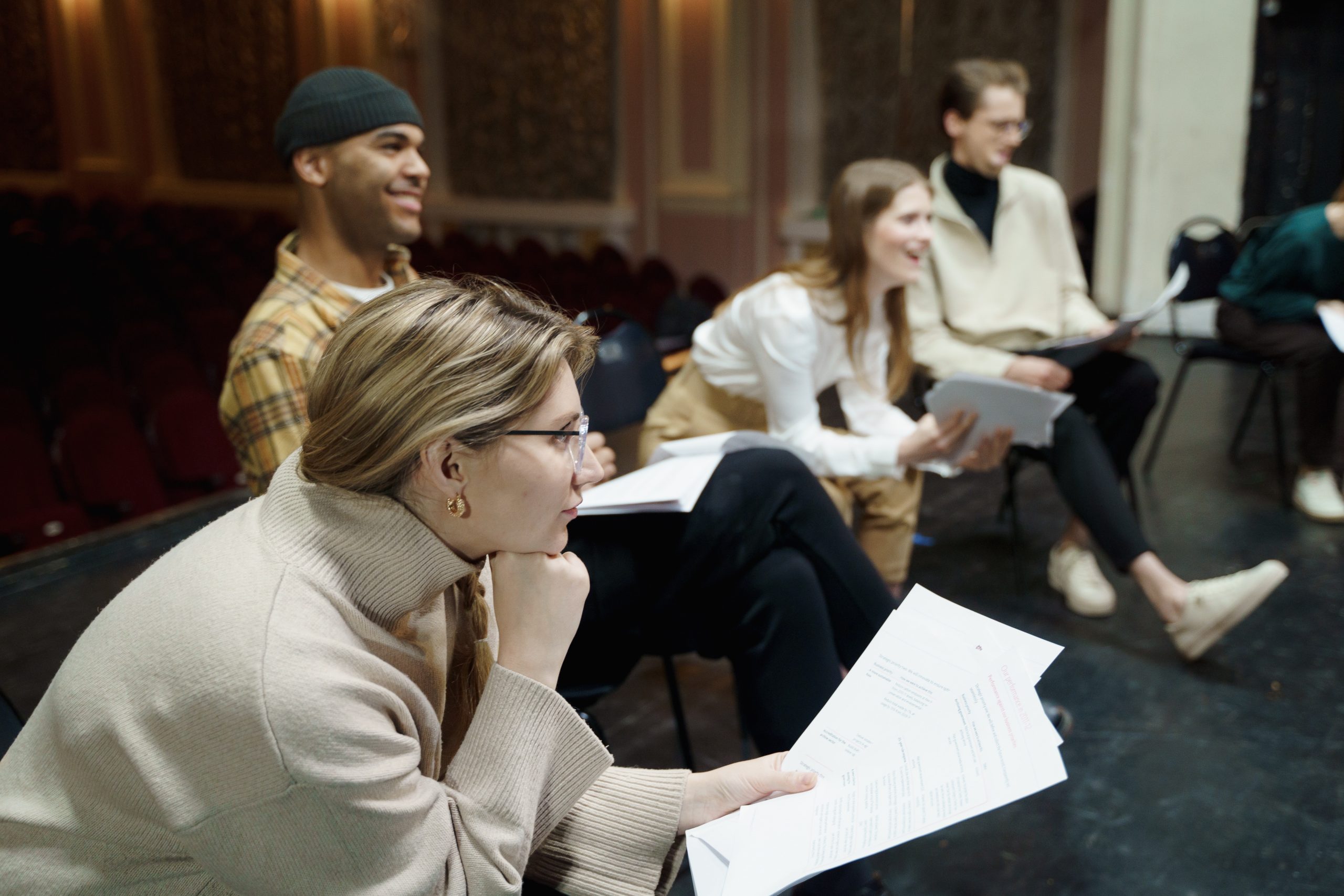 actors in a room reading a script